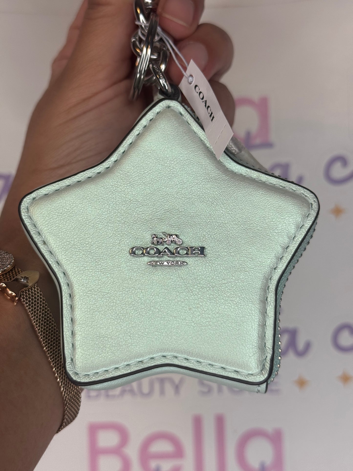 Coach star bag charm