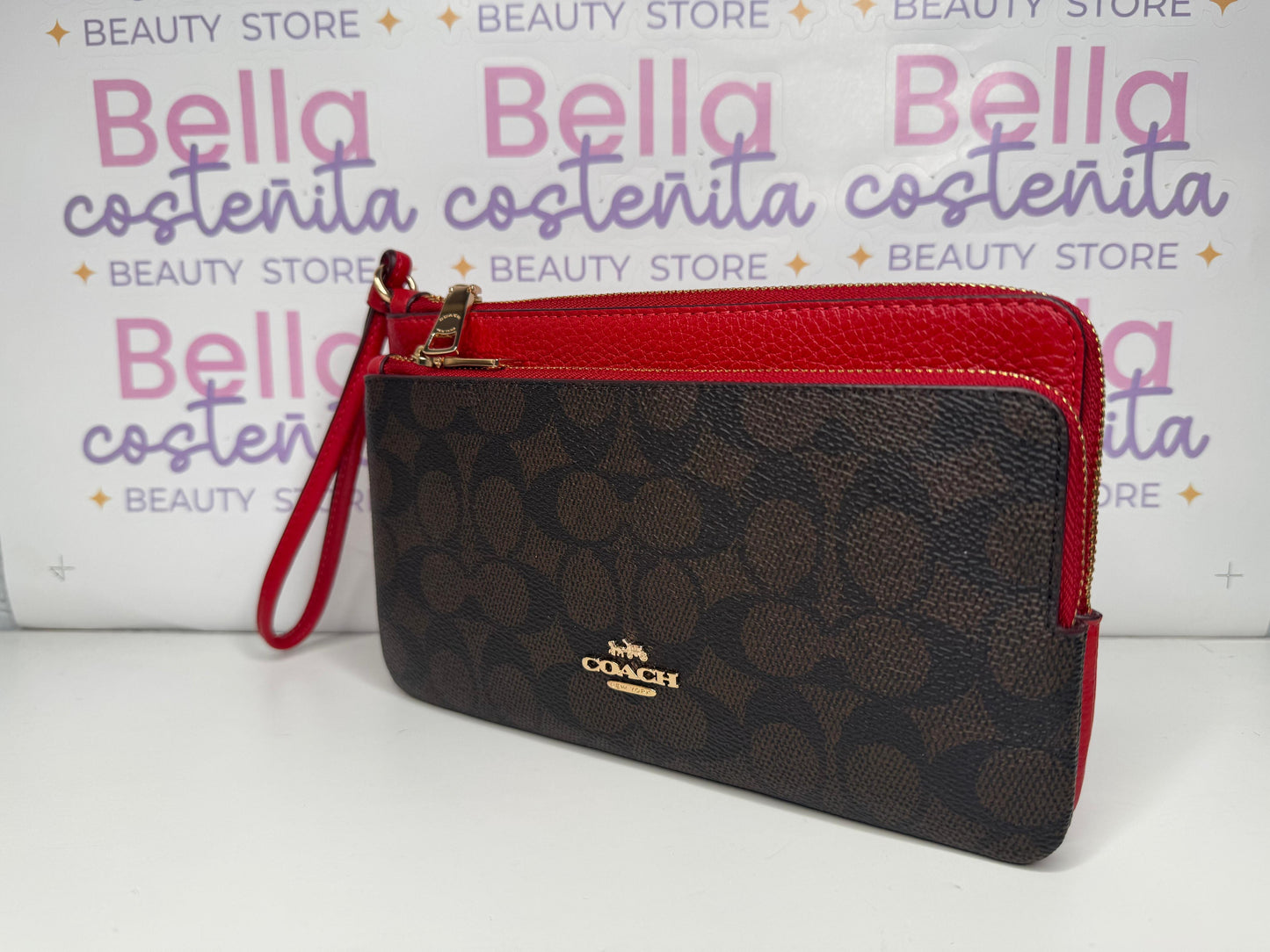 Coach double wristlet - rojo con café