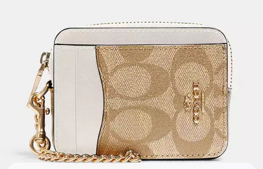 Coach zip card case beige con blanco