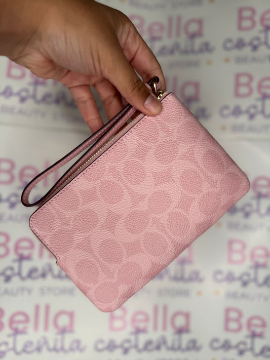 Coach - Wristlet Rosa con monograma